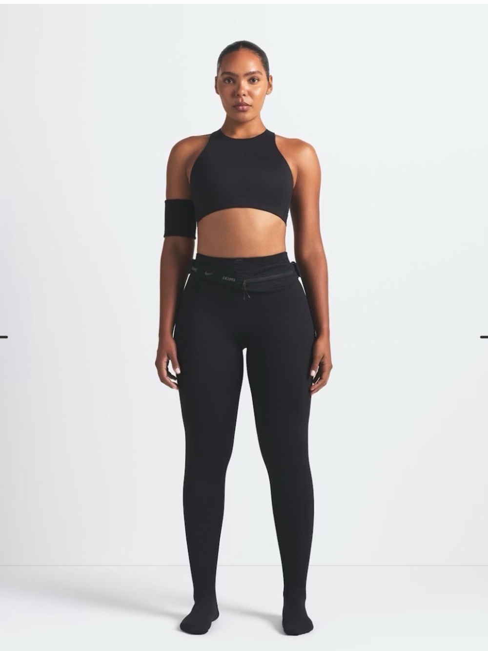 NWT - L NIKE SKIMS Matte Footsie grip leggings in Obsidian